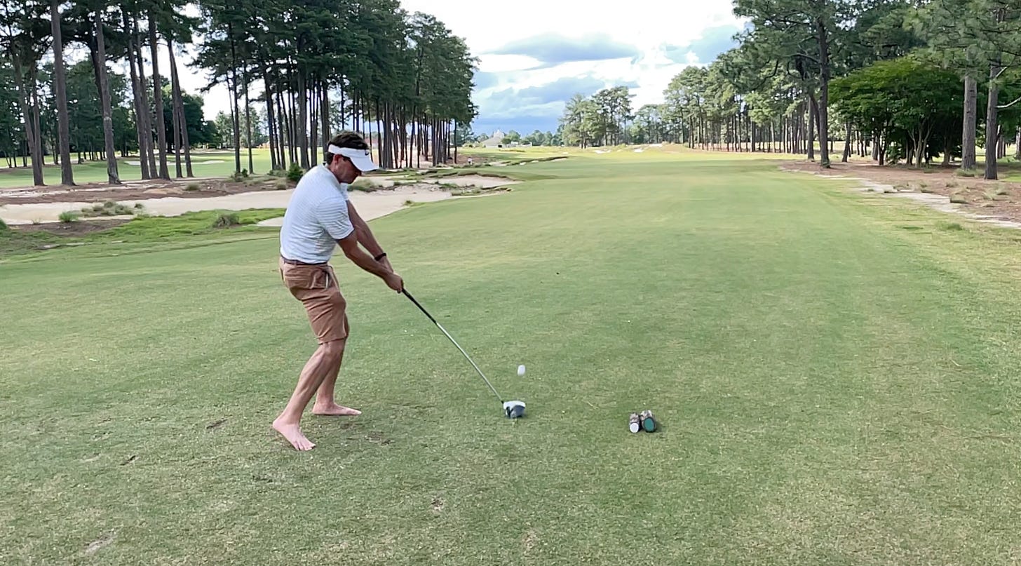 me teeing off, barefoot