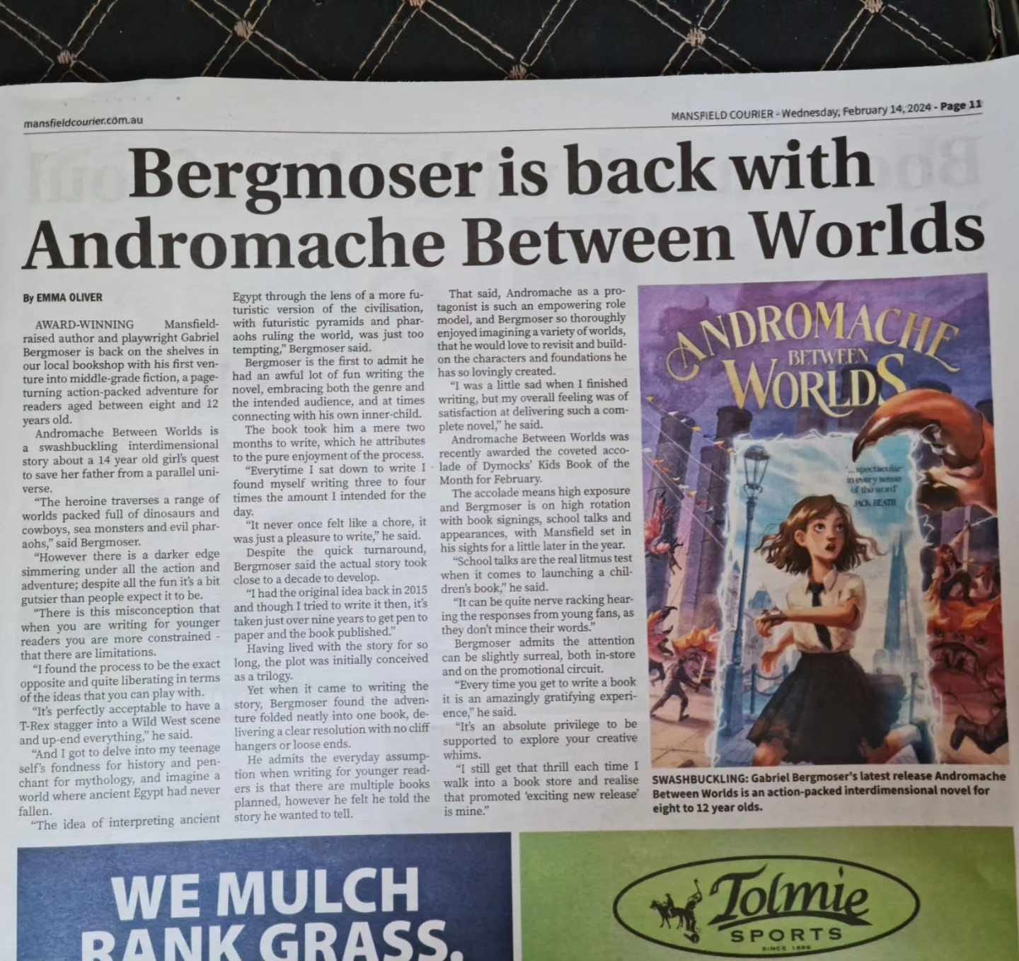 May be an image of text that says "mansfieldcourier.com.au Wednesday Bergmoser is back with Andromache Between Worlds the WORLDS NDROMACHE BETWEEN interpreting ancient creative that exciting SWASHBUCKLING: release' Bergmoser WE MULCH DANK GRASS xTolmie SPORTS"