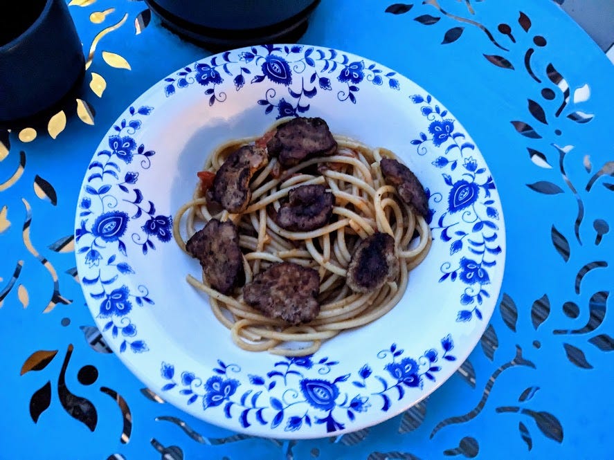 bowl of bucatini pasta w/ seared lion's mane mushrooms