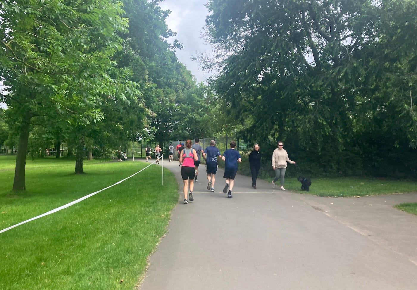 Tape protects the grass by the path where the event starts