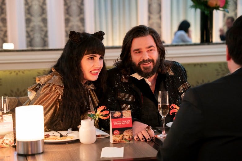 “WHAT WE DO IN THE SHADOWS” -- “The Casino” -- Season 3, Episode 4 (Airs September 16) — Pictured: Natasia Demetriou as Nadja, Matt Berry as Laszlo. CR: Russ Martin: FX