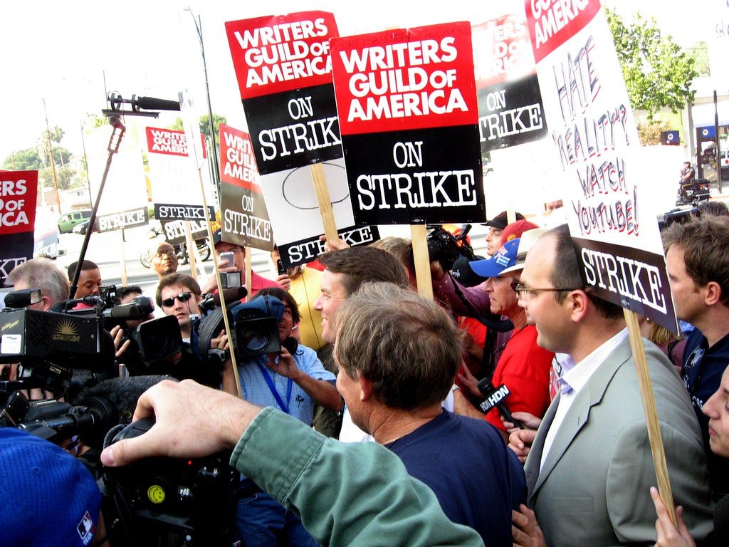 John Edwards pickets with striking WGA members | Photo by Ki… | Flickr