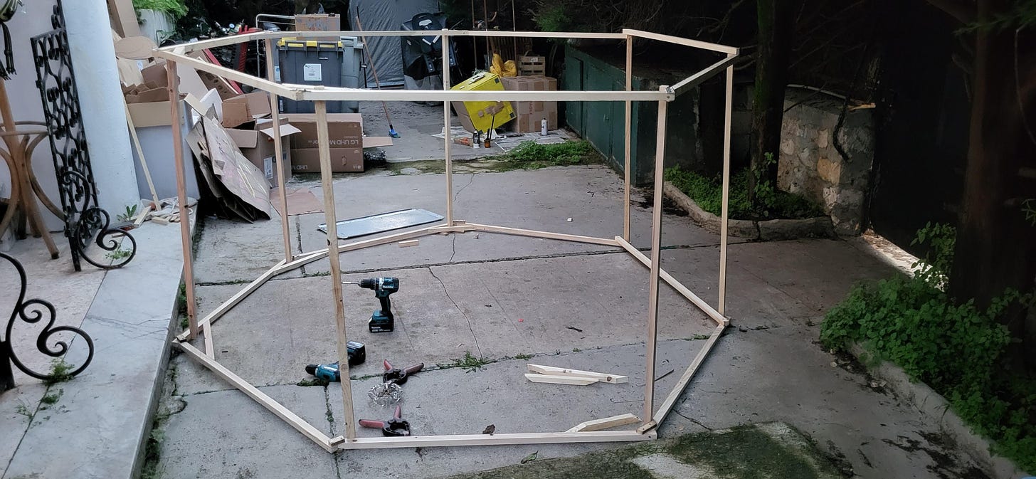 A wooden structure to make a mario pipe being built