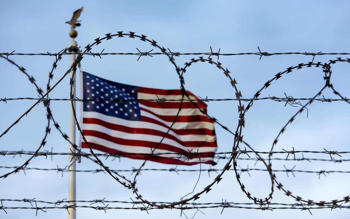 flag border wall asylum