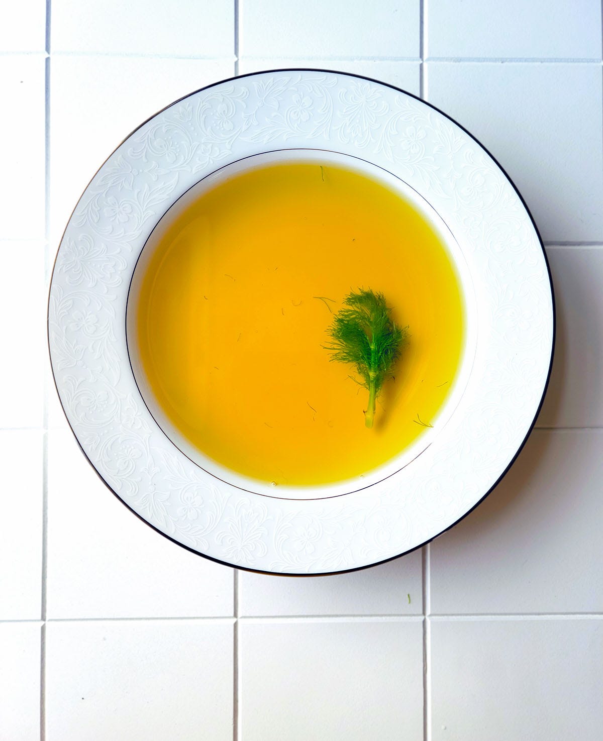 A bowl of fish consomme.