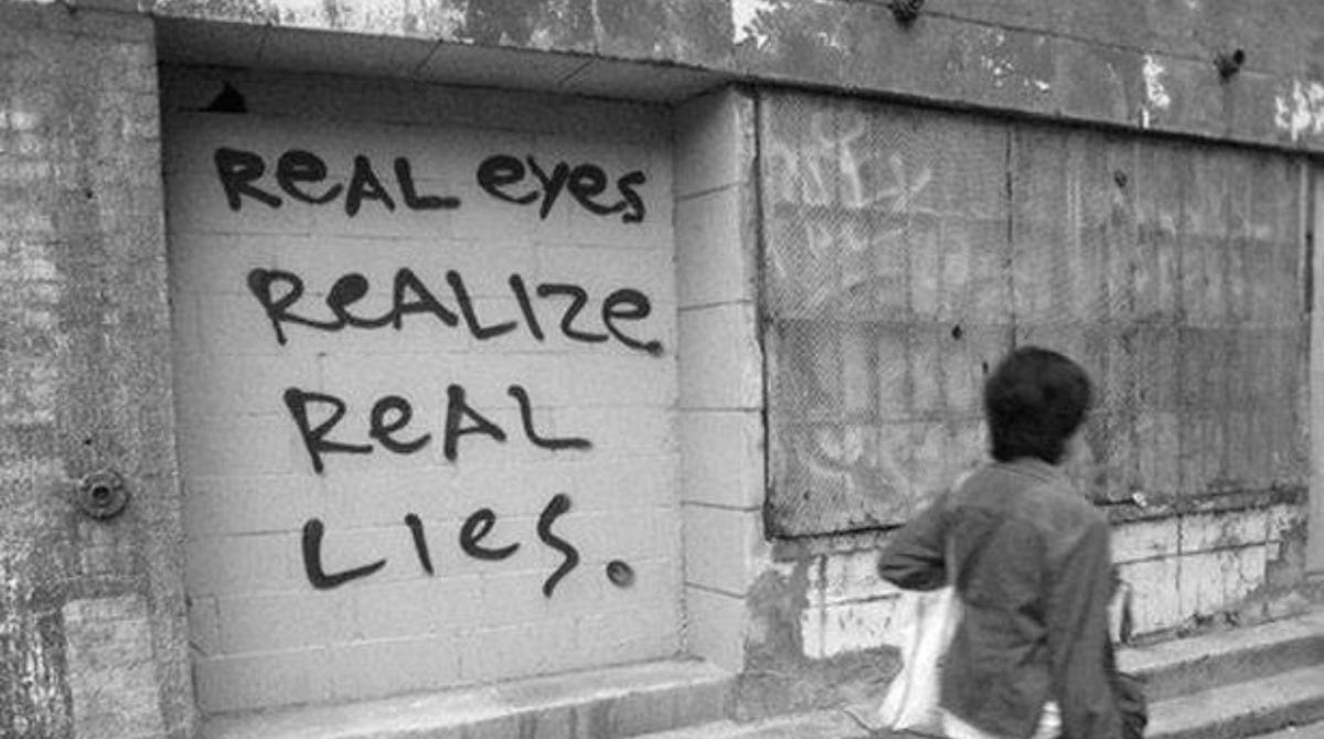 Graffiti on quote by Tupac Shakur's Real Eyes, Realize, Real Lies | STREET  ART UTOPIA