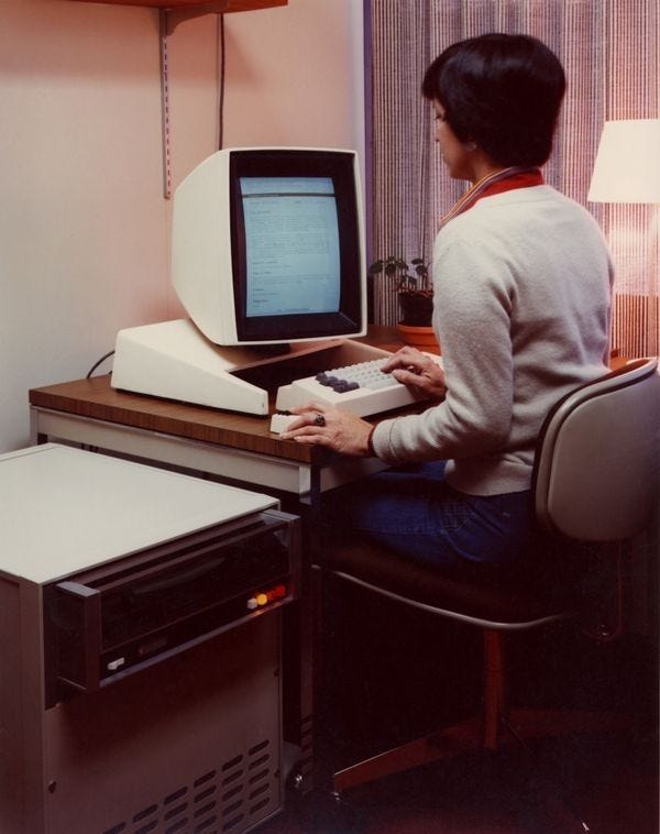 Photo of a Xerox Alto being operated by someone sitting at a desk.
