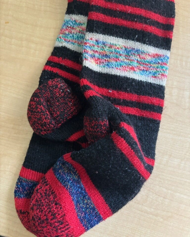 Red and blue striped hand-knit wool socks