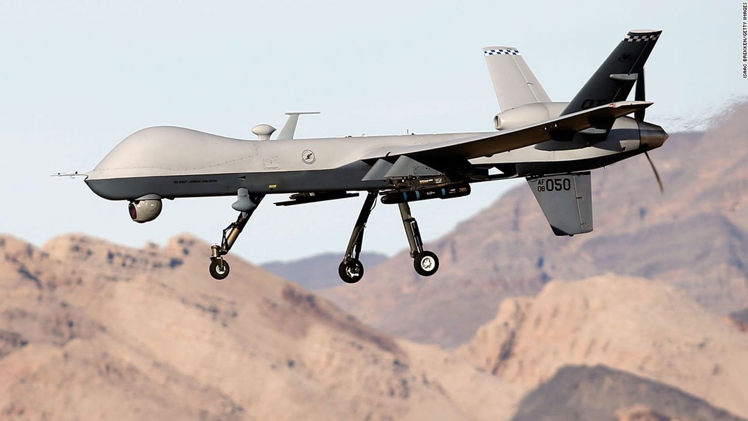 An MQ-9 Reaper remotely piloted aircraft (RPA) flies by during a training mission at Creech Air Force Base on November 17, 2015 in Indian Springs, Nevada.
