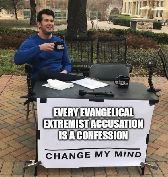 Man sitting at table on college campus with sign "every evangelical extremist accusation is a confession. Change my mind"