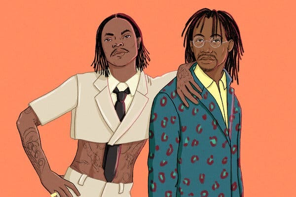 An illustration of two Black men against an orange background. On the left, Steve Lacy, stands with his hand hanging on the shoulder of the other man. He is wearing a cropped, light tan, short-sleeve blazer, a tie dark brown tie and light tan jacket. Tattoos can be seen on his arm, hand and abdomen. On the right is Raphael Saadiq, wearing white-frame glasses, a blue blazer with a red-and-light-blue pattern and a yellow shirt. 