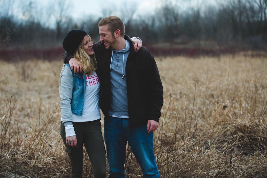 Free Photo of Couple Near the Field  Stock Photo