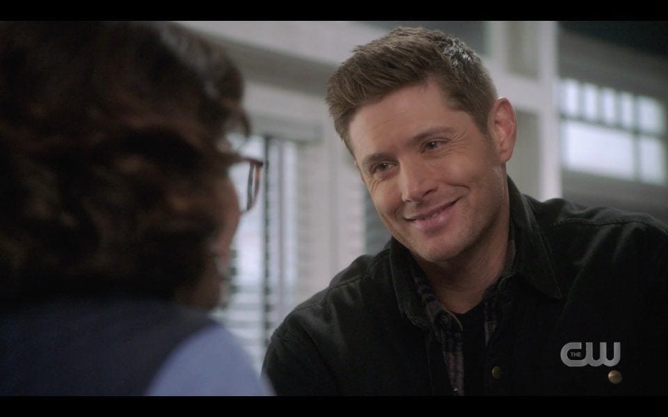 dean winchester smiling at woman puppy eyes spn 1413