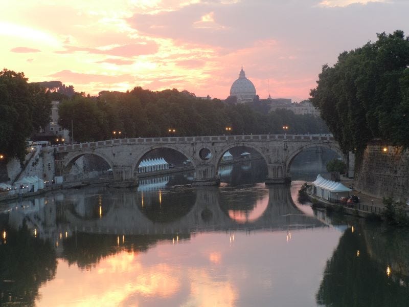 Rome's Ponte Sisto and Tiber River at sunset