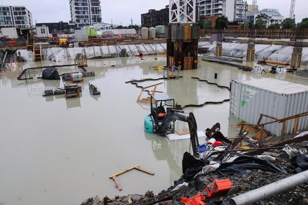 A flooded construction site in Auckland, New Zealand, on Saturday, the morning after the worst downpour since record-keeping began for the city.