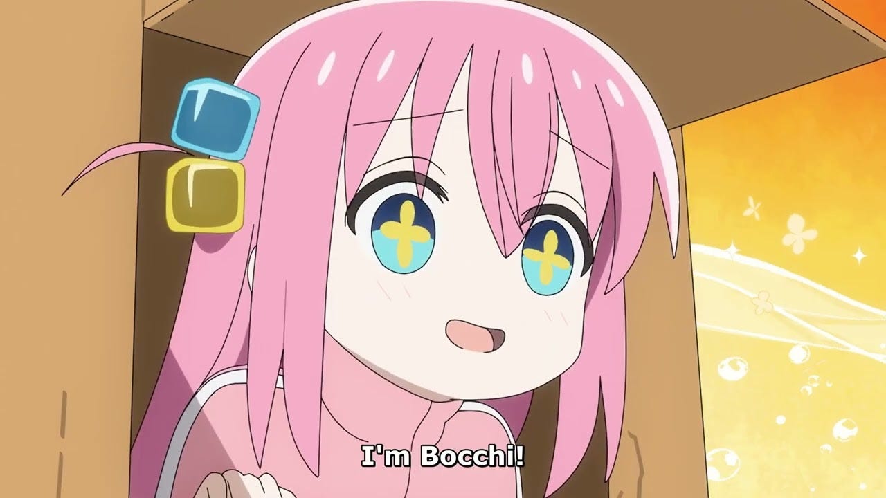 Bocchi poking her head out of a cardboard box, excited.