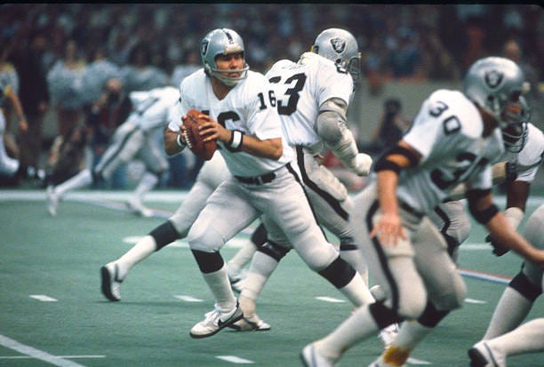 Jim Plunkett of the Oakland Raiders drops back to pass against the Philadelphia Eagles during Super Bowl XV at the Louisiana Superdome January 25,...