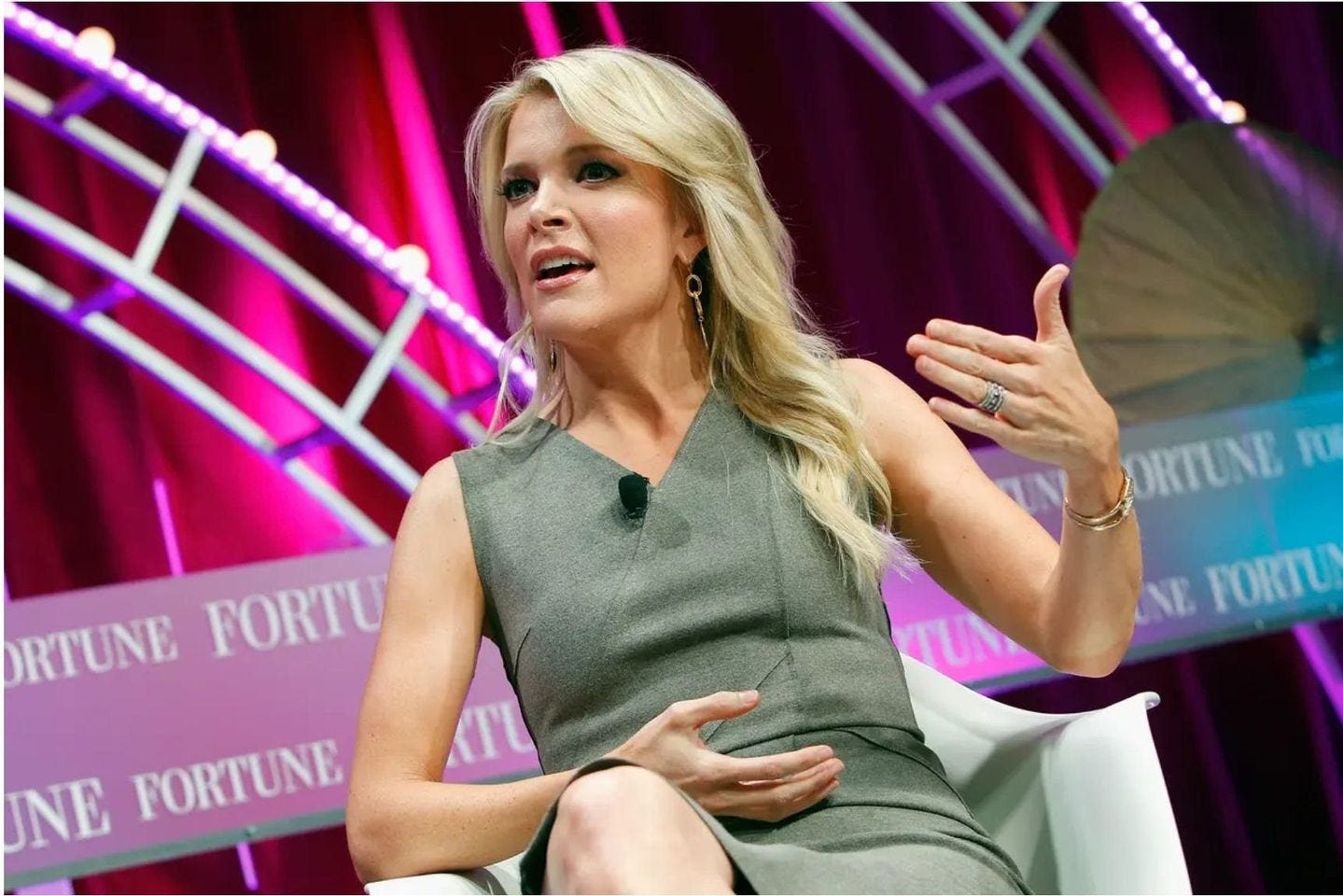 May be an image of 1 person, blonde hair and text that says 'ORTUNE FORTU ORTUNE LNE FORTU JNE FORTUNE TUN'