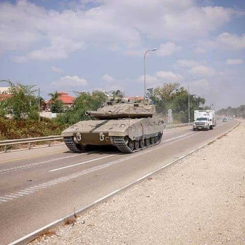 Israeli tanks seen on the roads in Israel's south, Oct. 8, 2023. Photo by Chaim Goldberg/Flash90.