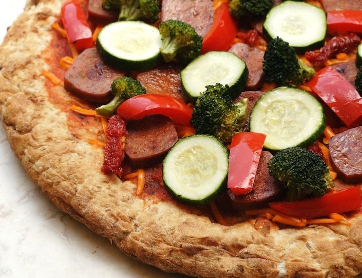 vegan sausage pizza with roasted vegetables