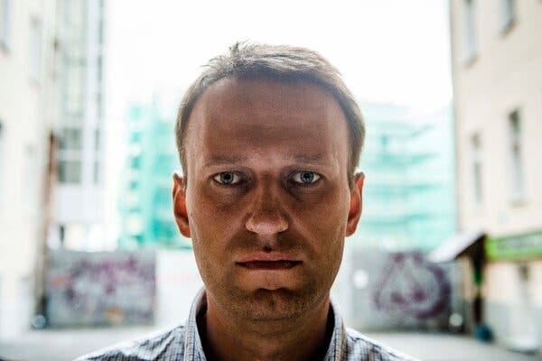 A portrait photograph of Aleksei Navalny staring at the camera.