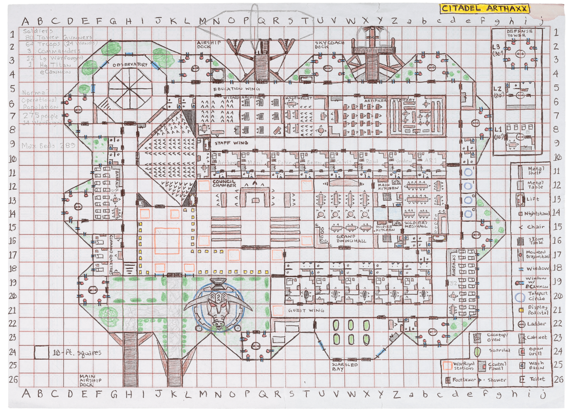 A detailed map drawn on graph paper showing the outline of a building is labeled “Citadel Arthaxx” in the upper right corner. In the lower left corner, a scale notation drawn around one square of the graph paper says “10 ft. squares.” Interior rooms show labels including “Observatory,” “Staff Wing,” “Grand Dining Hall,” and “Council Chamber.” There is a section of the map labeled “Education Wing” with individual rooms labeled “Wizard”, “Architect,” “Magewright,” and “Artificer.” Each hand-drawn room includes tiny icons, which, according to a legend in the lower right corner of the map, show tables, chairs, windows, and other pieces of furniture. On the outside of the building on the lower left side, green landscaping surrounds a large, gray boar head with red eyes.