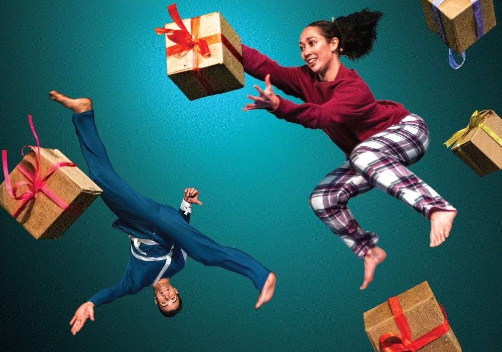 two people in pyjamas leaping through the air, catching gifts wrapped in ribbon