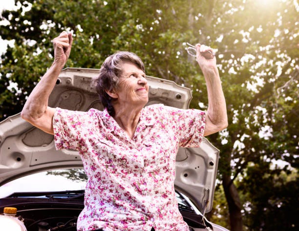 Angry Old Woman With Brokendown Car Shakes Her Fists Stock Photo - Download Image Now - iStock