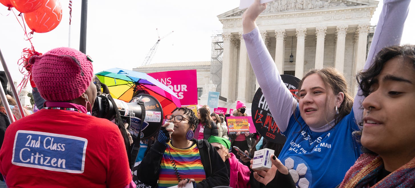 Photograph of pro-abortion demonstrators outside the Supreme Court.