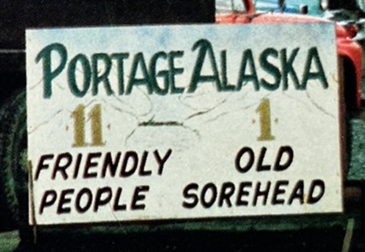 As you entered the town of Portage, Alaska, you were greeted with this sign.
