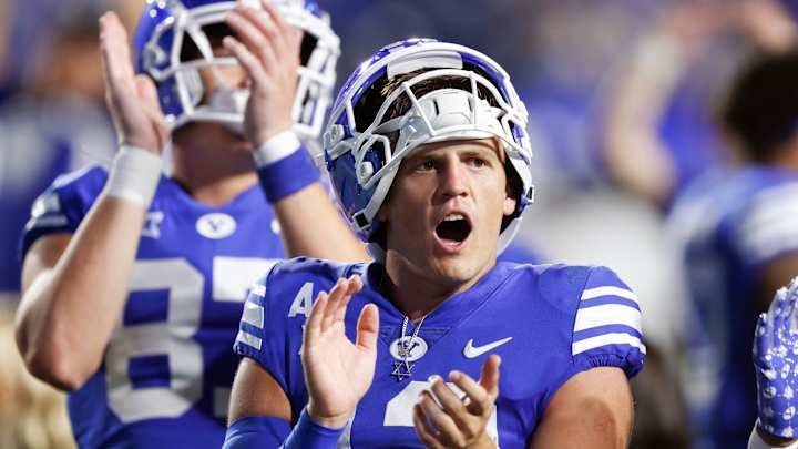 Jake Retzlaff celebrates with his team as BYU won their week one battle with SIU.