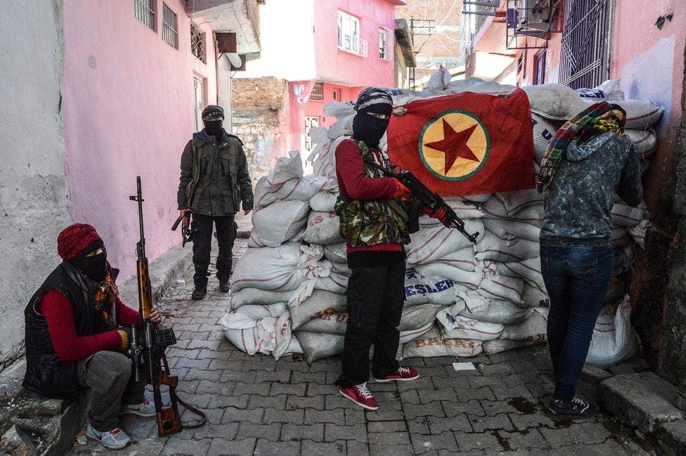 Fighters with PKK flag in Diyarbakir, 18 Nov 15