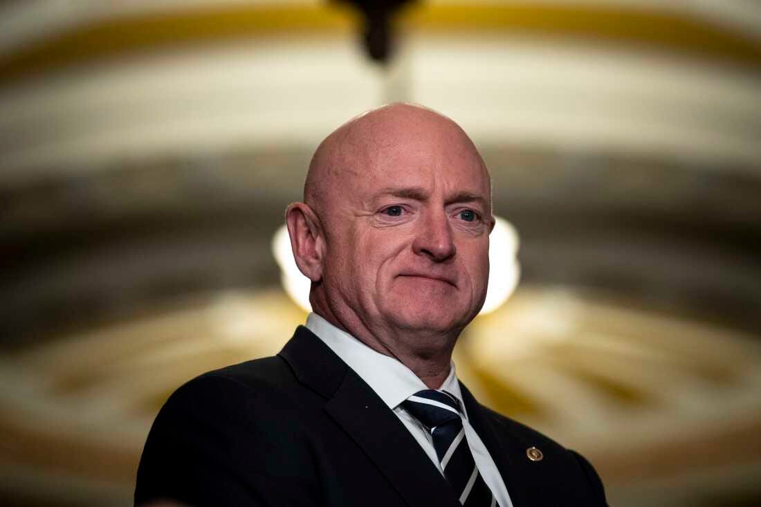 Sen. Mark Kelly (D-AZ) waits to speak during a news conference following a closed-door lunch meeting with Senate Democrats at the U.S. Capitol March 22, 2023 in Washington, DC.