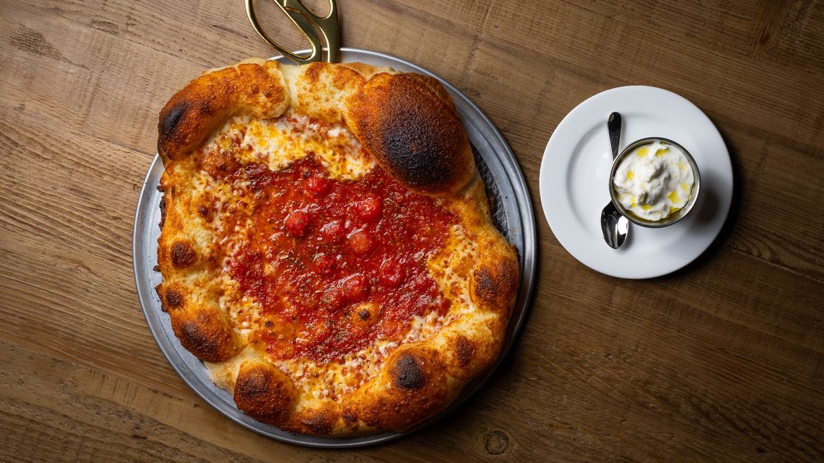 A puffy Neapolitan-style pizza.