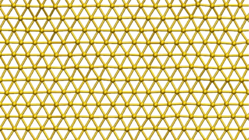 A lattice of gold-colored spheres, with each sphere connected by lines to six of its neighbors