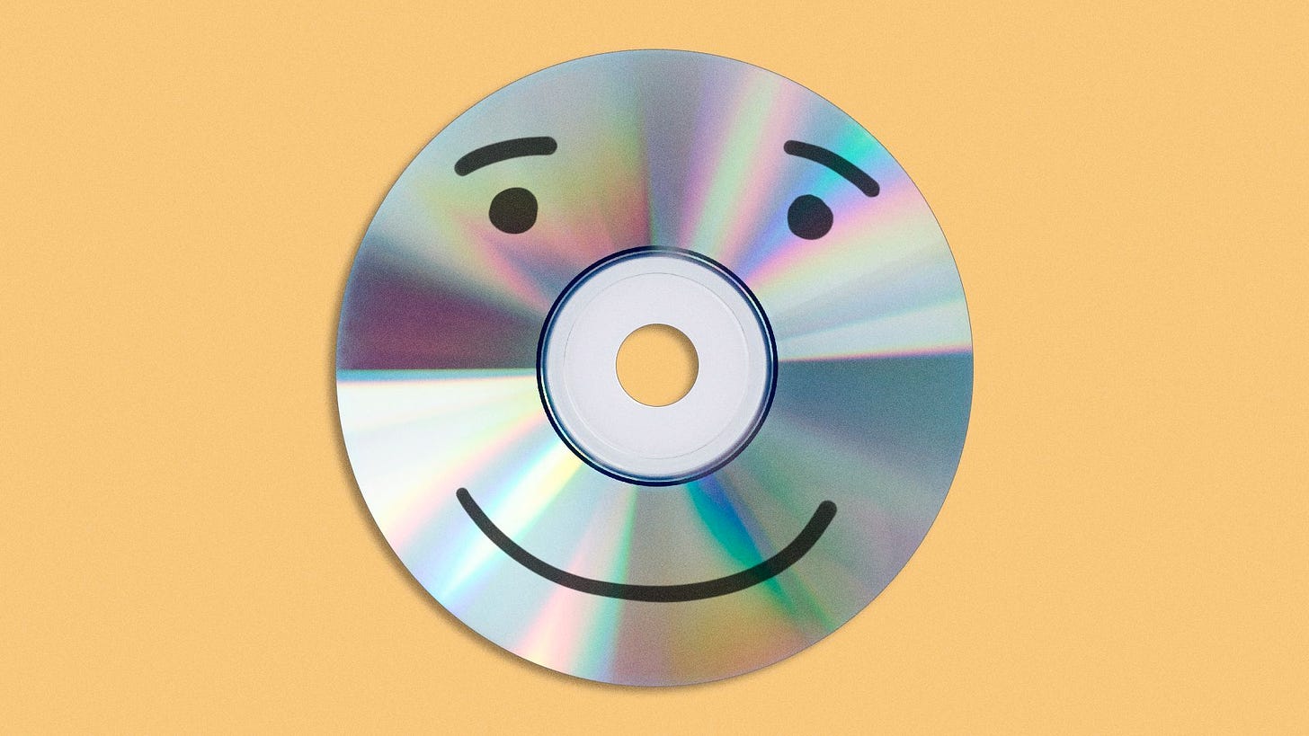 Illustration of a CD with a smiley face drawn on it.