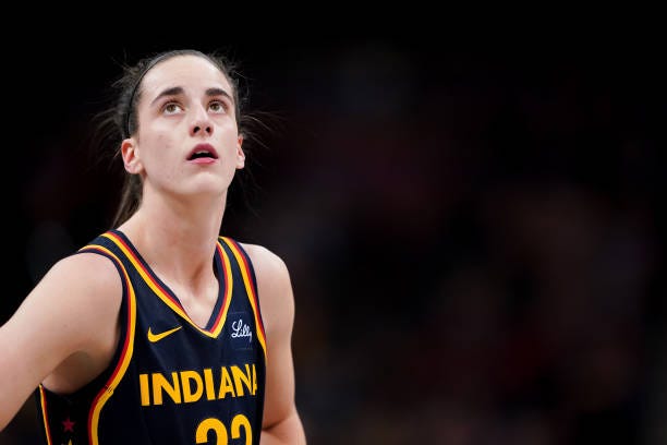 Caitlin Clark of the Indiana Fever walks across the court in the first quarter against the New York Liberty at Gainbridge Fieldhouse on May 16, 2024...