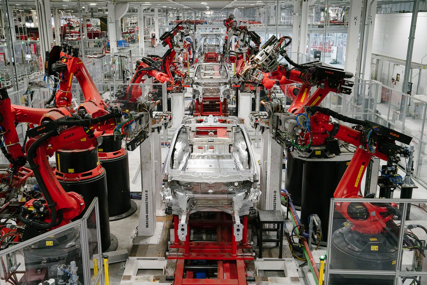 Why Amazon warehouses, Tesla auto plants will not go 100%-robot