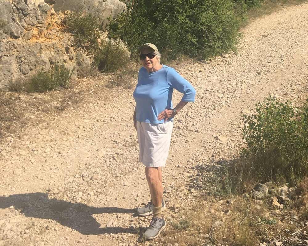 Katharine Esty, PhD relishing a hike while on vacation in France.