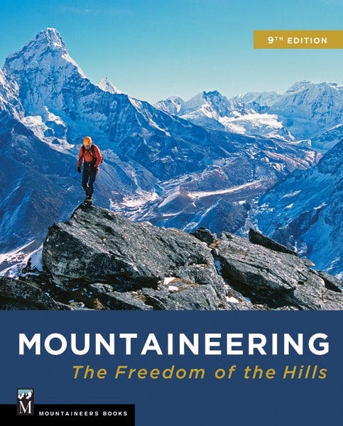 Book cover image showing a climber standing atop a rocky peak