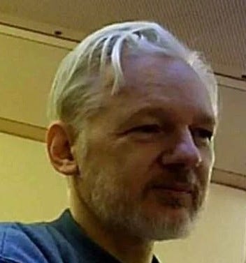 Julian Assange captive of Upchuck the 3rd evil torturers