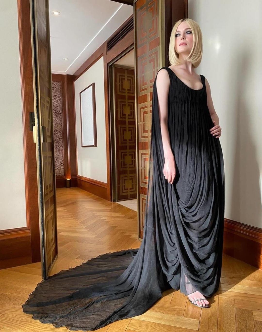 Black dress for Cartier event in Vienna | IG post 5/29/24 : r/ElleFanning