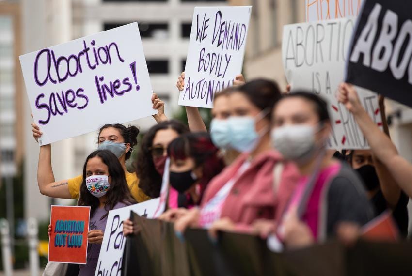 Protestors gather in front of the Governor's mansion in Austin to protest against SB 8, an anti-abortion bill in the senate, on May 19, 2021.