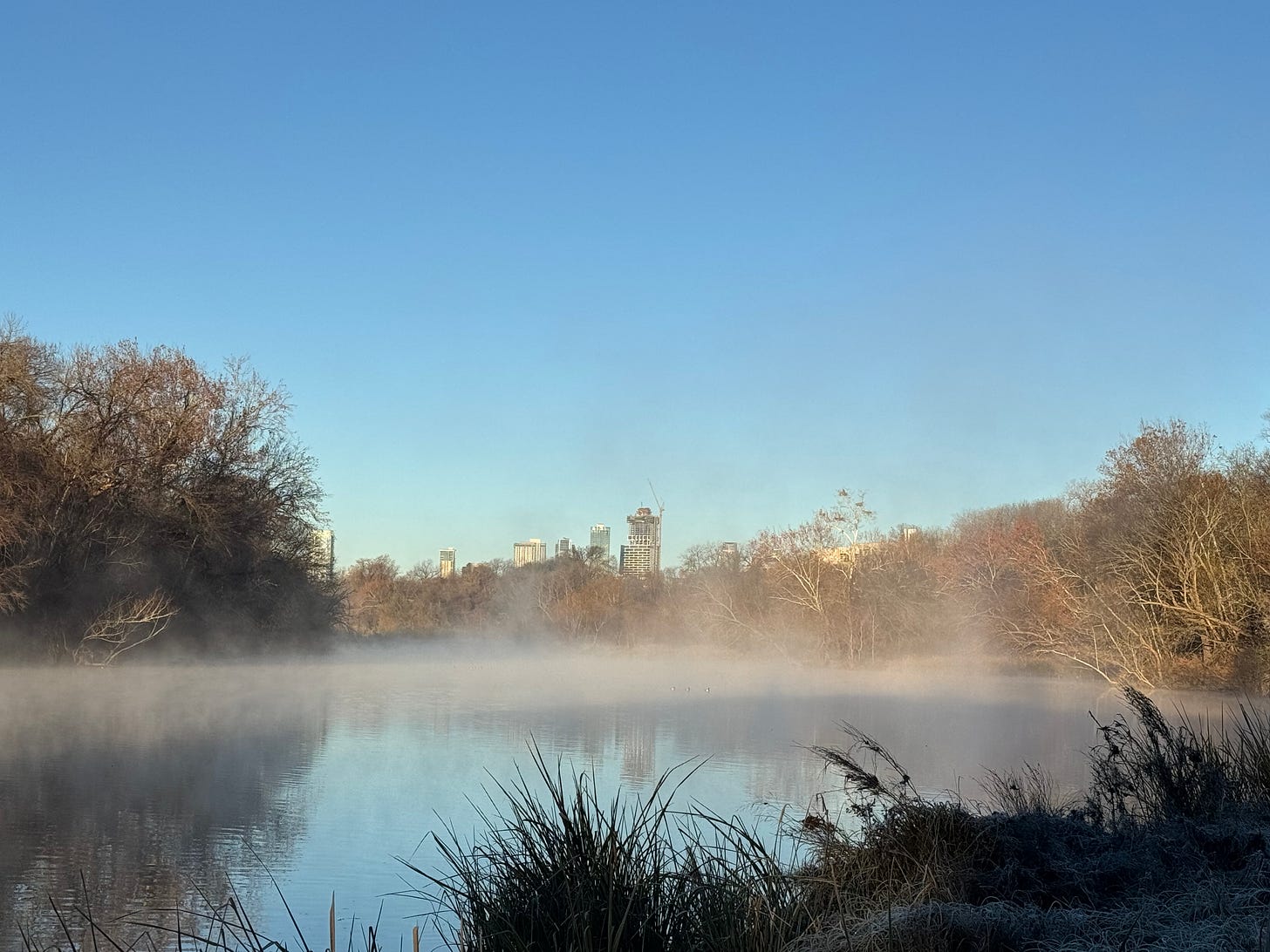 River in fog with Austin skyline in the background