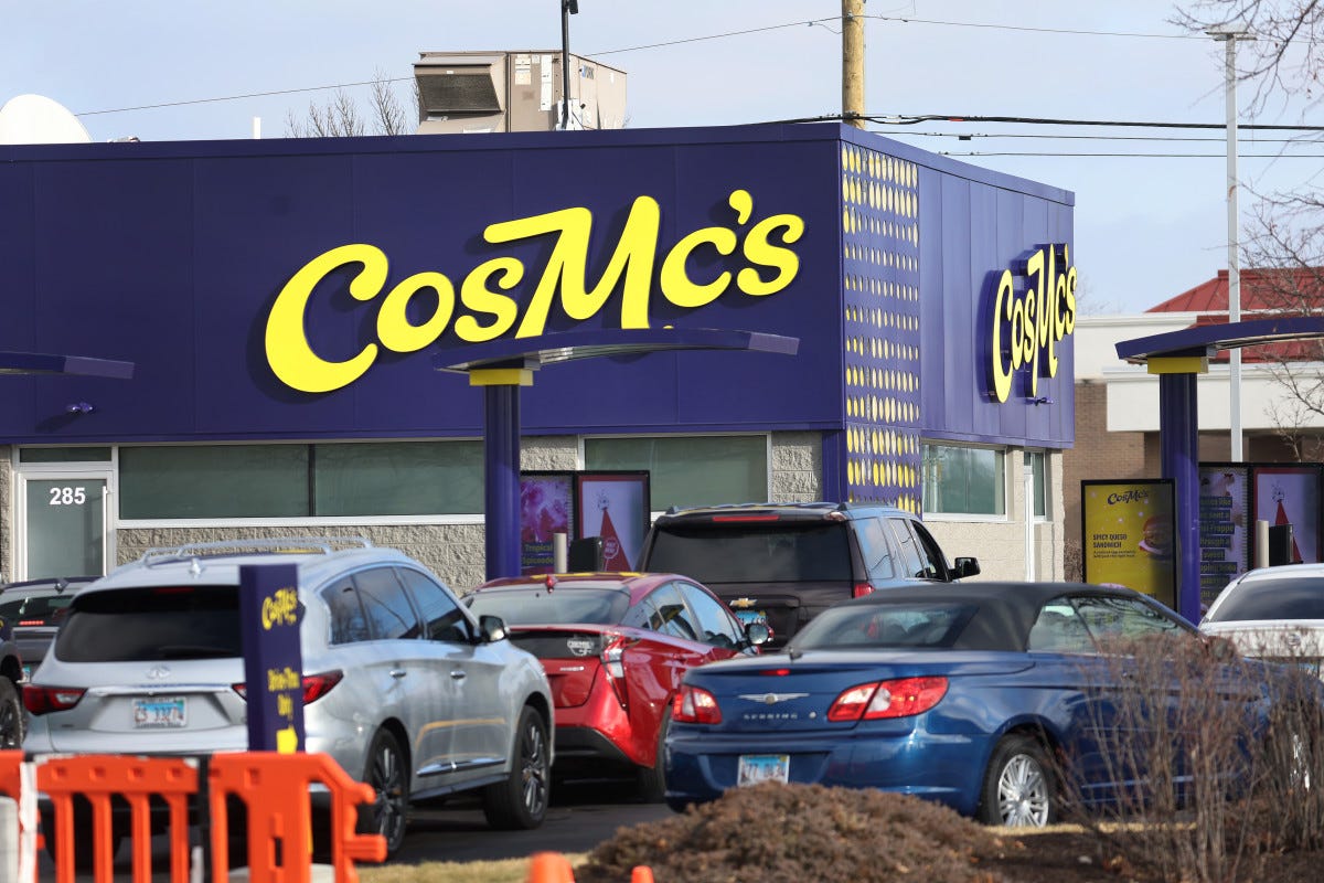 BOLINGBROOK, ILLINOIS - DECEMBER 11: Customers place their orders at CosMc's, a concept restaurant recently launched by McDonald’s on December 11, 2023 in Bolingbrook, Illinois. Lines to order food and beverages at the drive-thru-only restaurant, which opened to the public late last week, have been as long as 6 hours. (Photo by Scott Olson/Getty Images)