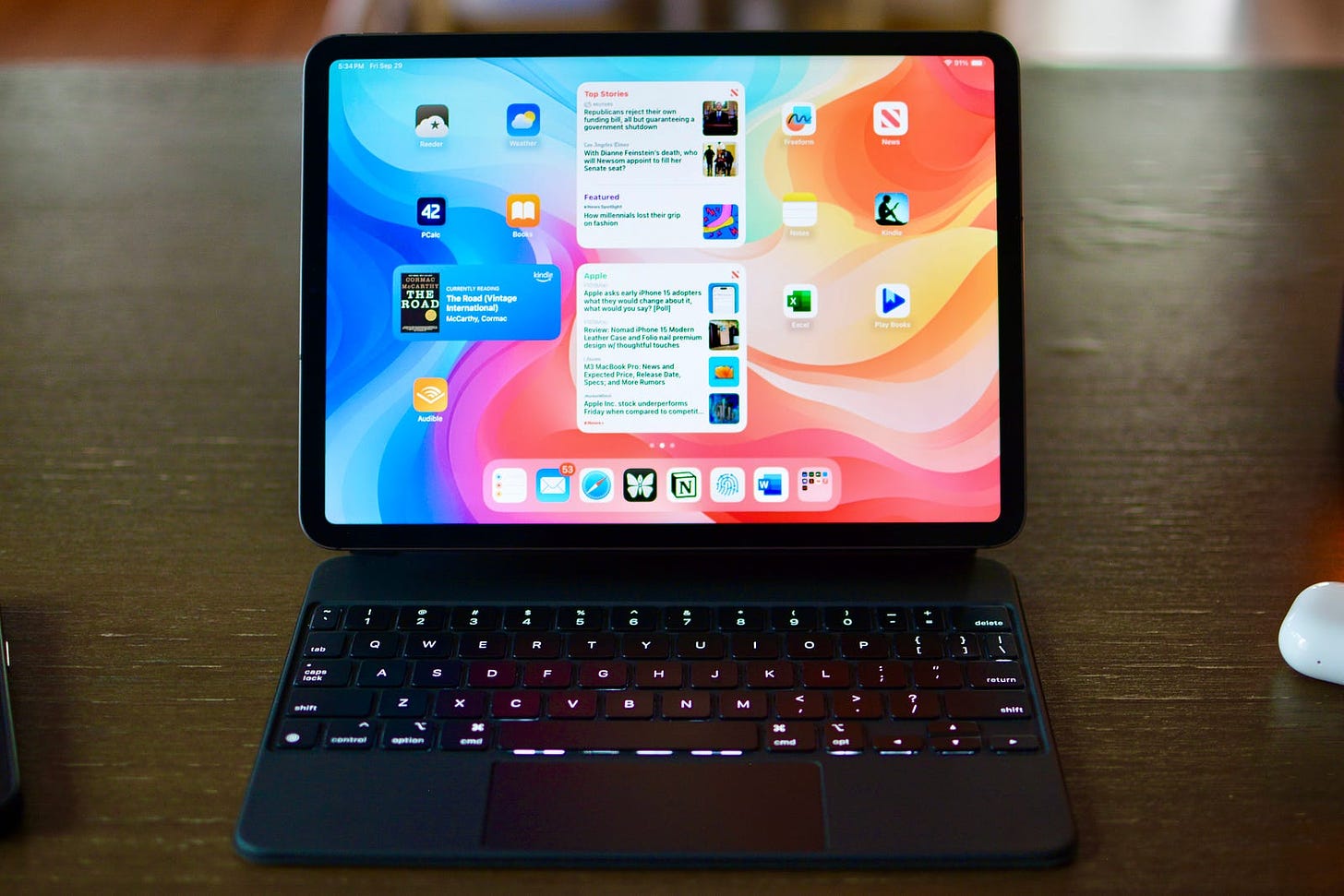 iPad Pro and Magic Keyboard on homescreen.