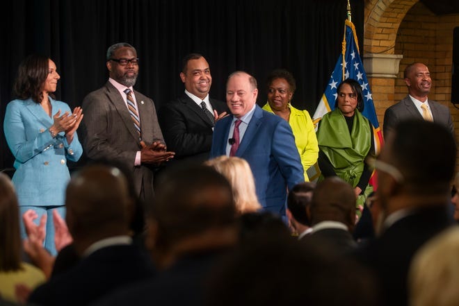 Detroit Mayor Mike Duggan, center, greets members of the Detroit City Council before delivering the 2024 State of the City Address on Wednesday, April 17, 2024 at Dexter Avenue Baptist Church in Detroit.
