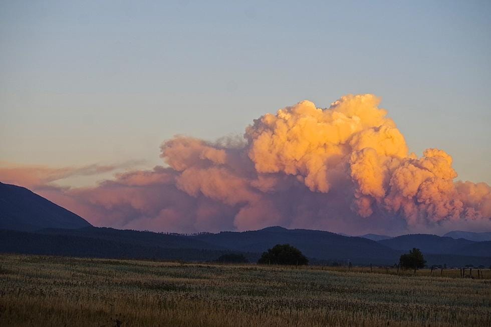 Big Knife Fire near Missoula. Smoke billows in the sky at sunset. 7000 acres consumed, seven percent contained, as of August 19.