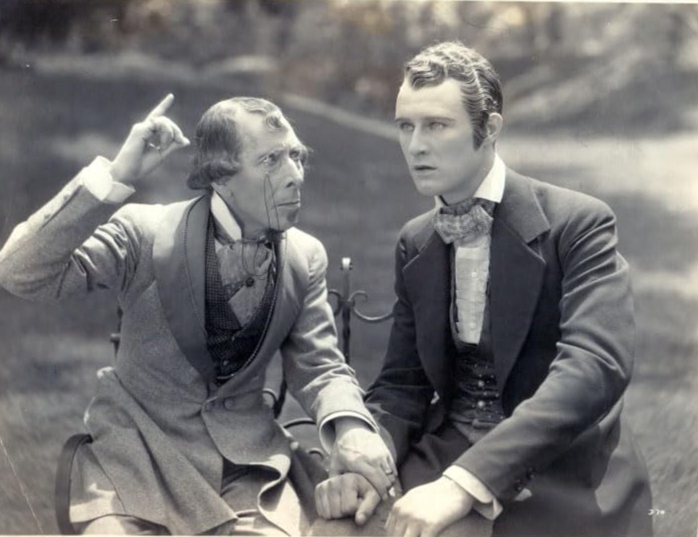 George Arliss and Anthony Bushell in a scene from Disraeli