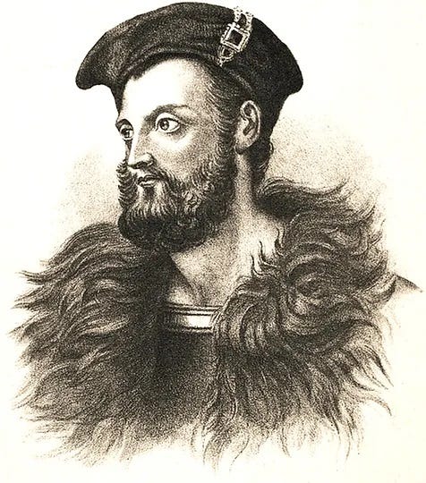 Black and white image of man with thick beard, wearing a fur collar and a beret style hat with jewel and buckle on one side. He has a high forehead and aquiline nose and is looking to his right.